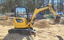 koparka caterpillar CAT 302.7 DCR 2015 - Bobcat E35, ładowarka Volvo