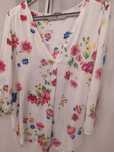 Camisa com mangas
