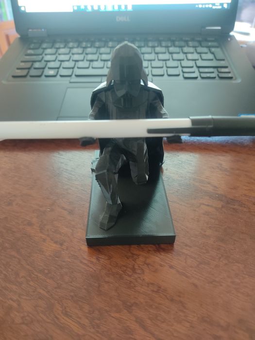 Darth Vader segura a sua caneta