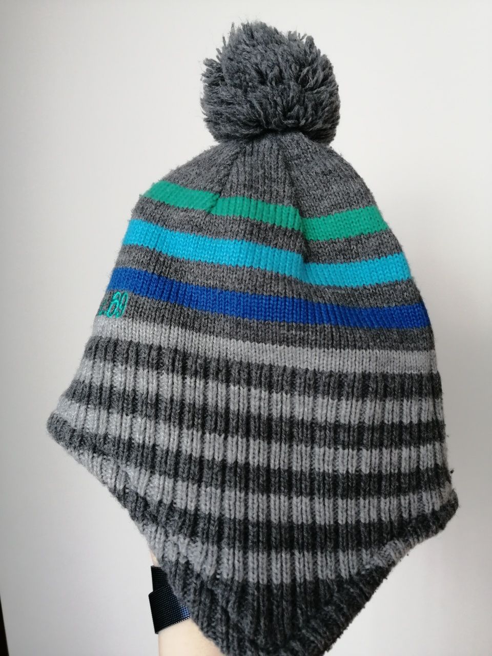 Czapka zimowa Reserved r. 9-12 m-cy Szara z pomponem na polarze