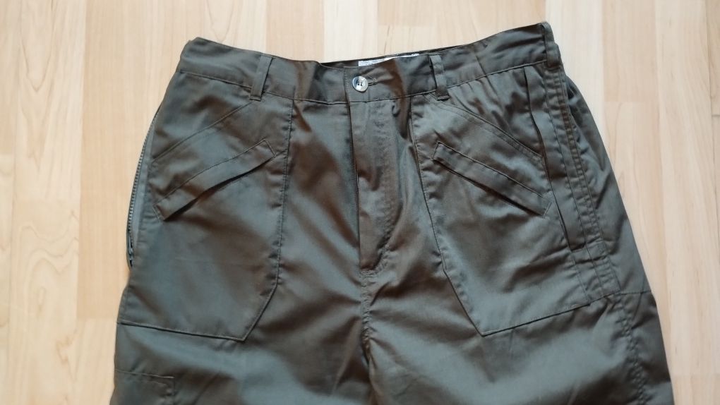 Spodnie trekkingowe Champion Wenlock® z wieloma kieszeniami są metki