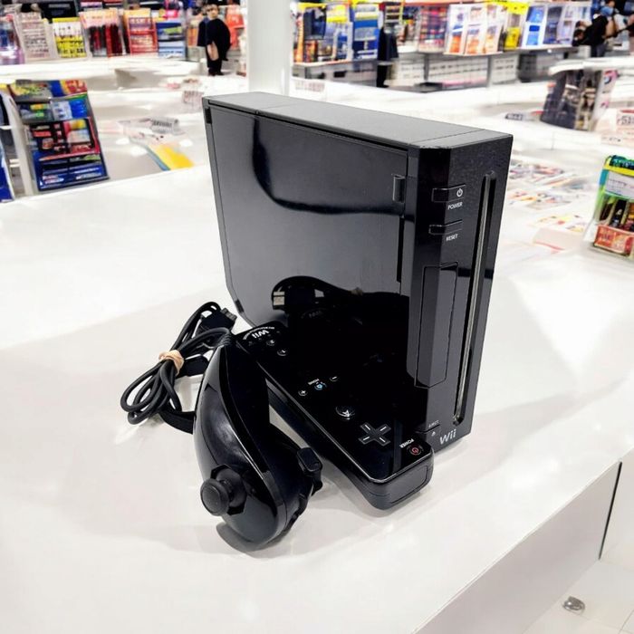 Wii preta com comando