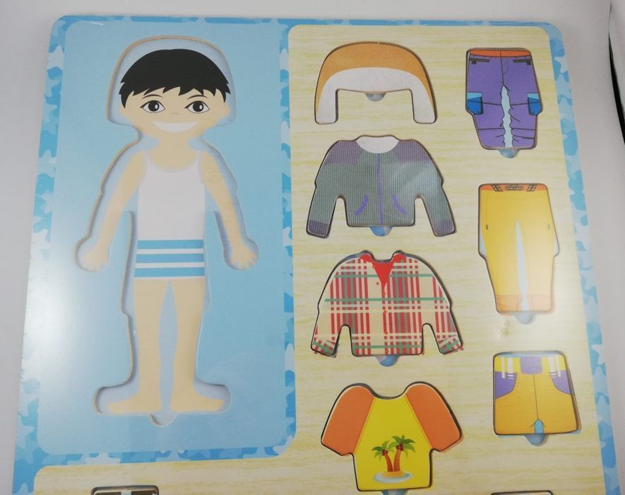Nowa Drewniane puzzle edukacyjne układanka ubrania chłopiec ubierz