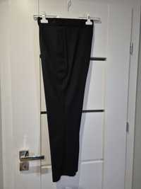 Eleganckie garniturowe spodnie 152