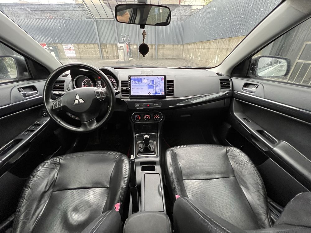 Mitsubishi Lancer 2012 • 1.6 МКПП ГАЗ/БЕНЗИН