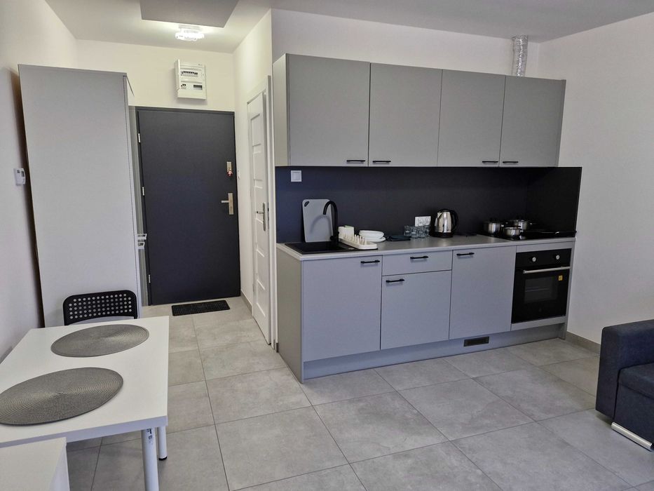 Mieszkanie kawalerka parter brak czynszu taras parking centrum