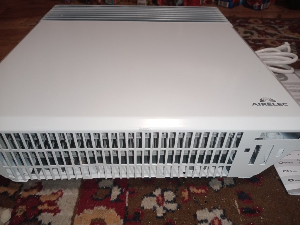 Продам камин, обогреватель, конвектор  Airelec