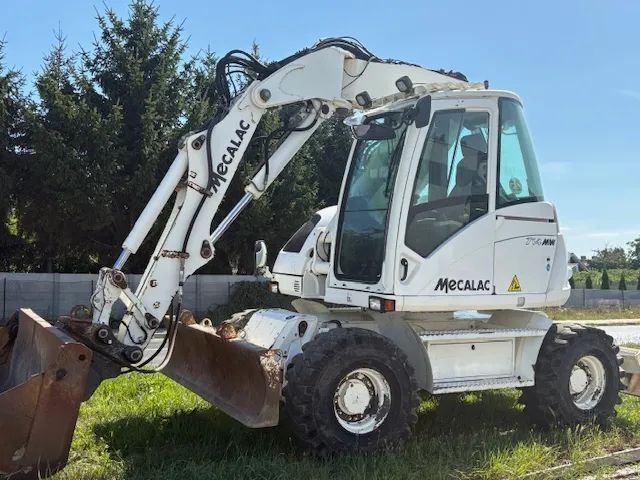 Mecalac 714 MWe  Mecalac 714 MWe, super stan.