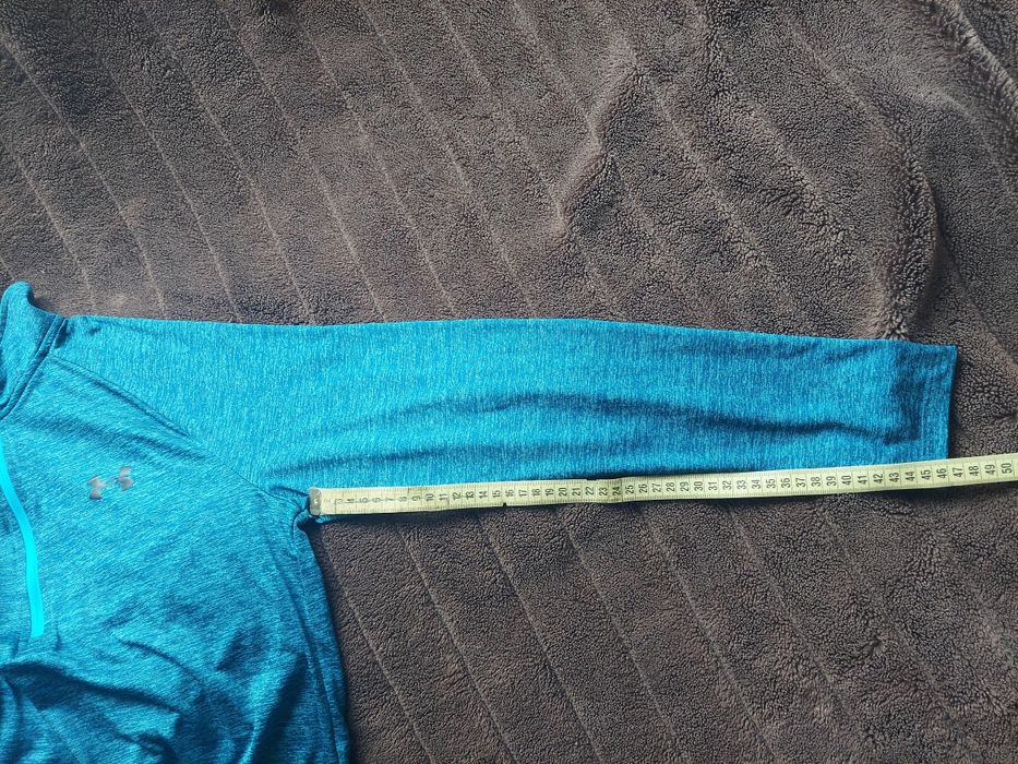 Кофта футболка фірми Under Armour оригінал 

Розмір по бірці: S

Детал