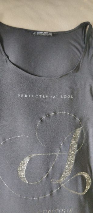 Blusa aberta de lado