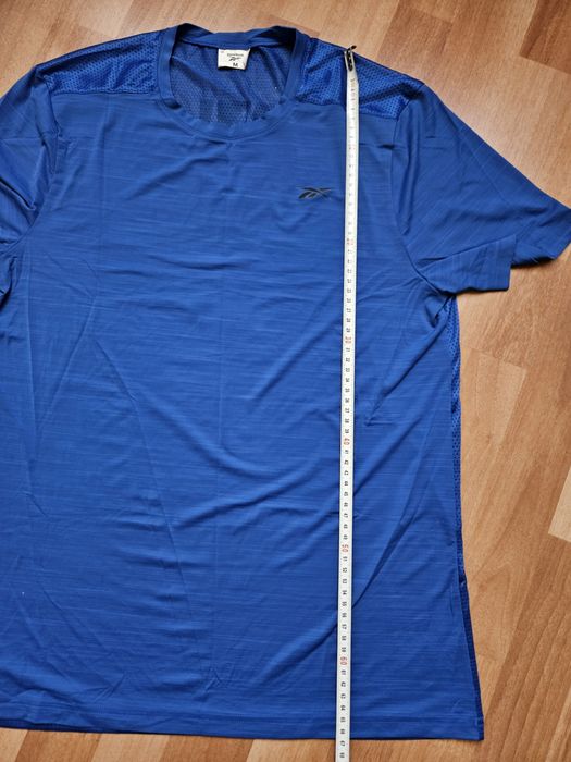 Продам футболку для бега , занятием спортом Reebok.