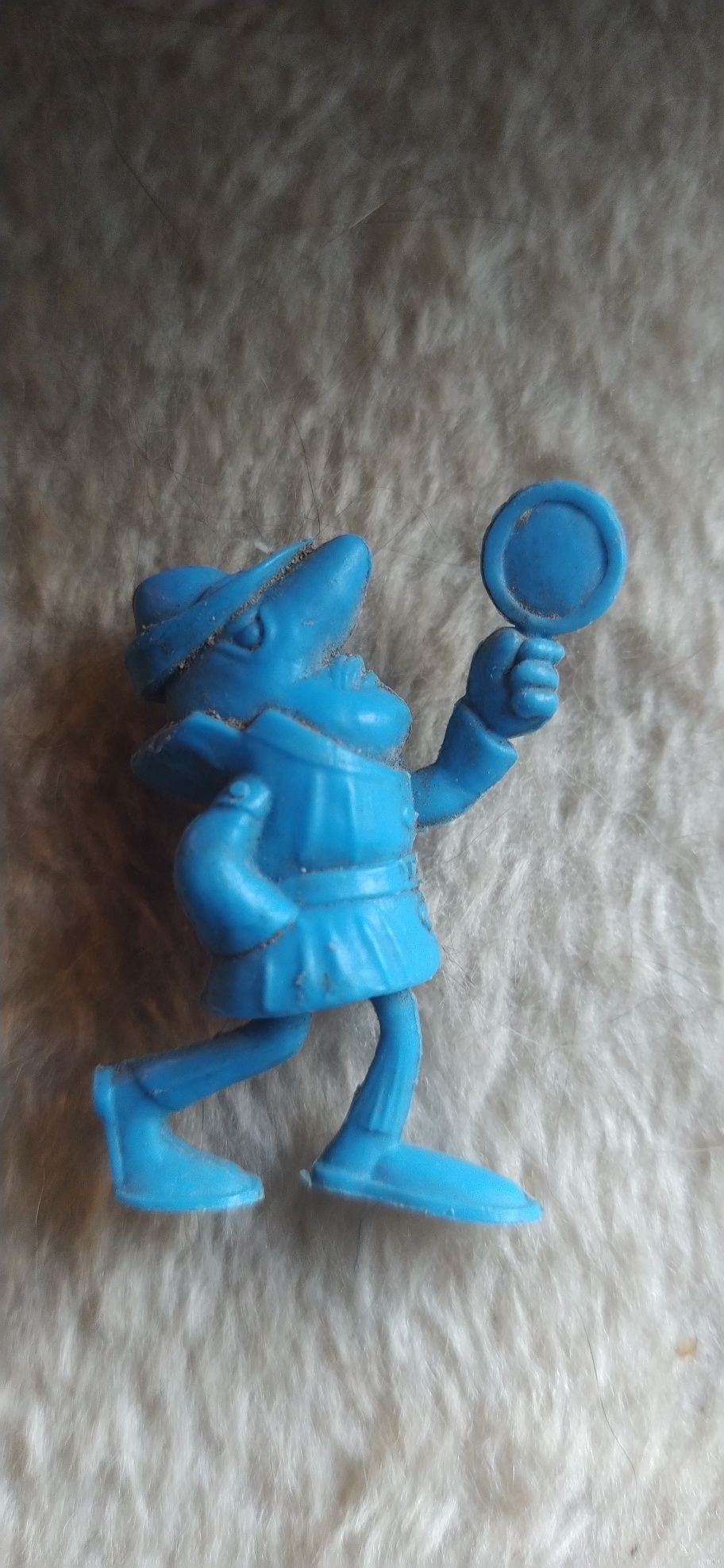 Boneco monocromático antigo