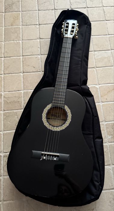 Guitarra classica Stagg + saco/mochila de transporte