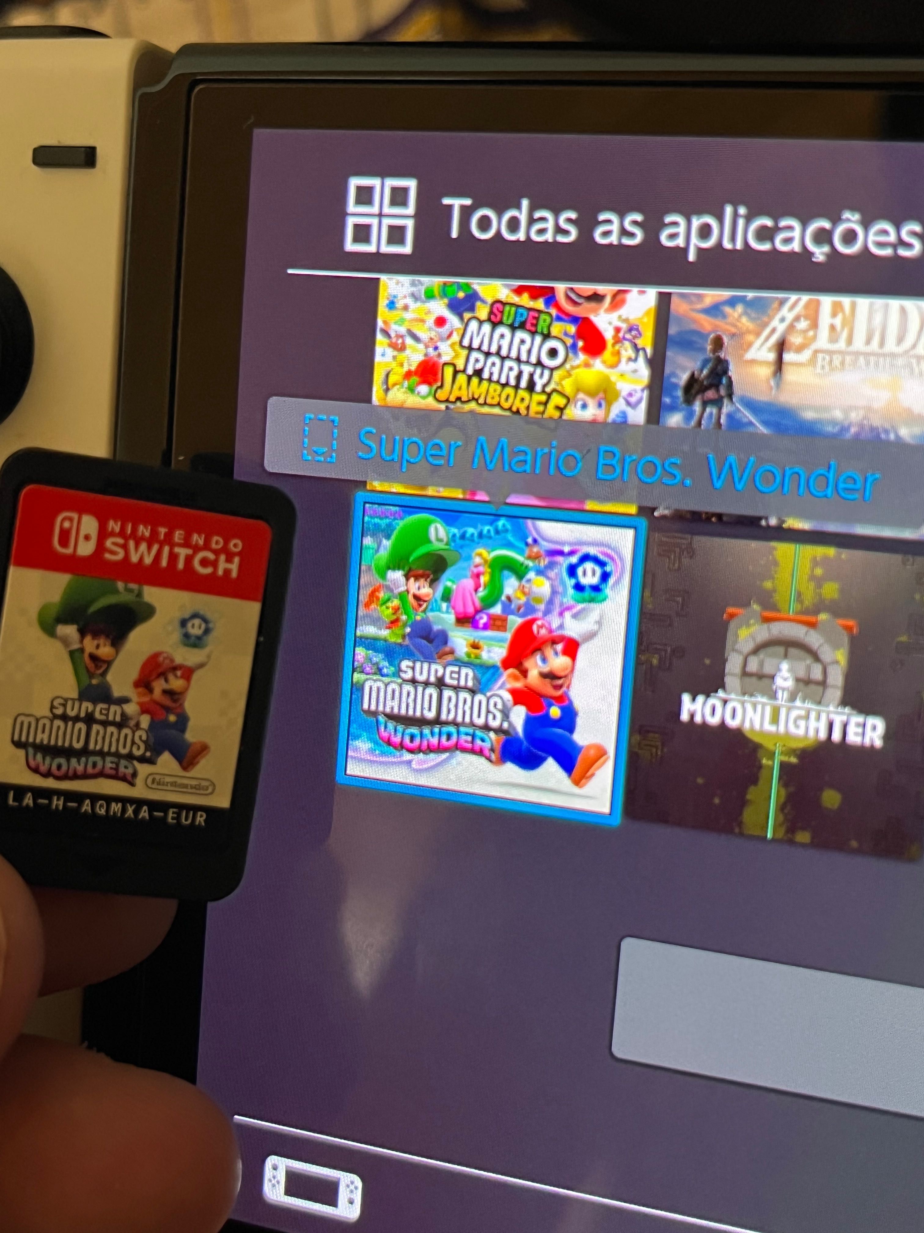Nintendo Switch OLED + Bolsa + 2 joycons + 3 jogos fisicos