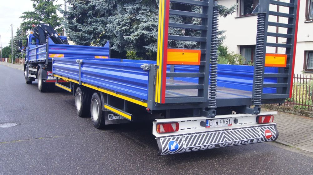 Ackermann  przyczepa laweta niskopodwoziowa z najazdami na sprężynach do maszyn