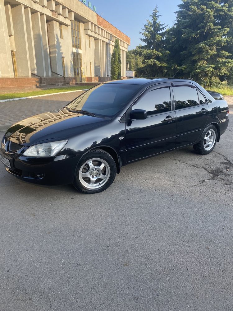 Lancer 1.6 механіка
