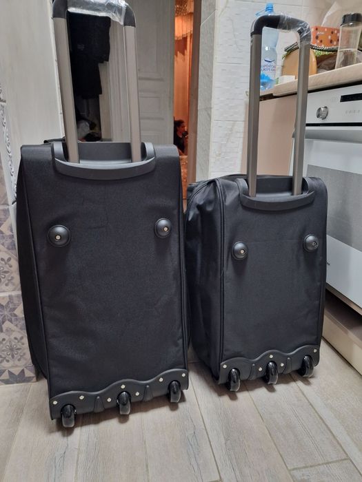 Сумка ручна без колес та з колесами і ручкою висувною .