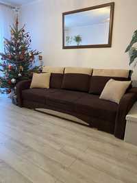 Duża kanapa z funkcją spania zrobiona przez stolarza