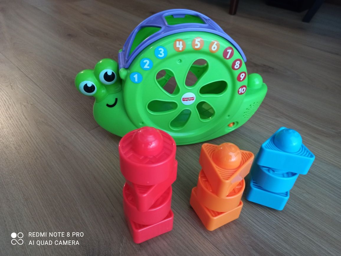 Fisher Price Śpiewający Ślimak Sorter kształtów FRC19