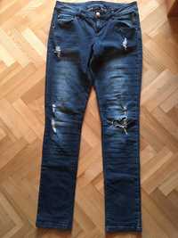 Spodnie z dziurami Esmara M L 40 jeansy jak nowe przetarcia gumowane
