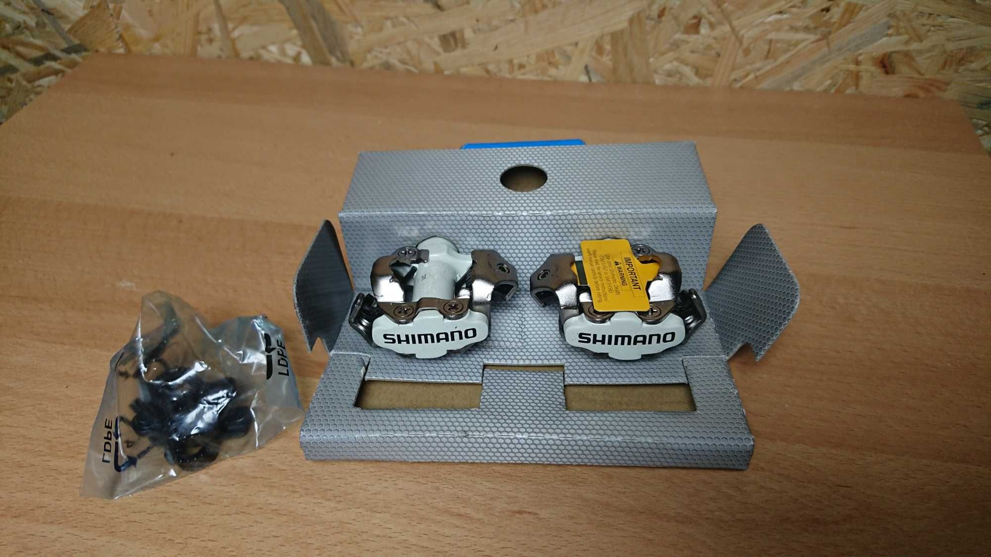 Pedały SPD z blokami M520 Shimano białe NOWE