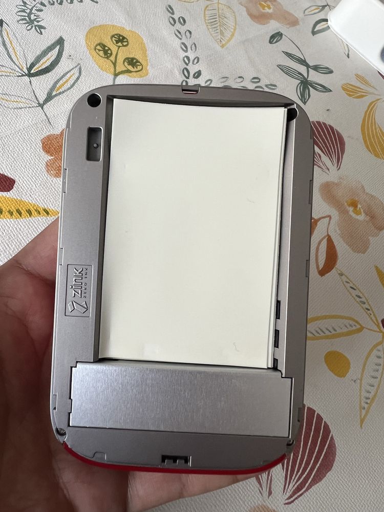 INSTANTLY PRINT 2 x 3" photos from your SMARTPHONE