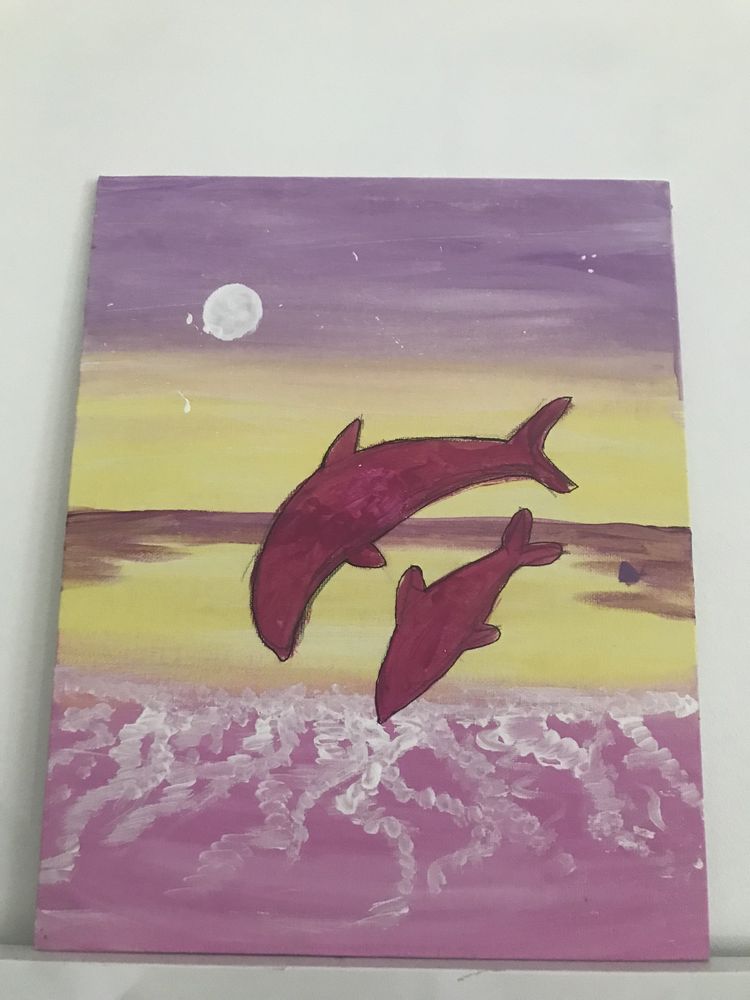 Obraz z delfinami.