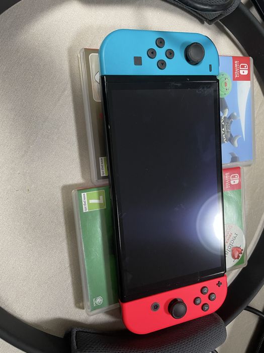 Nintendo Switch Oled + jogos + extras e acessorios