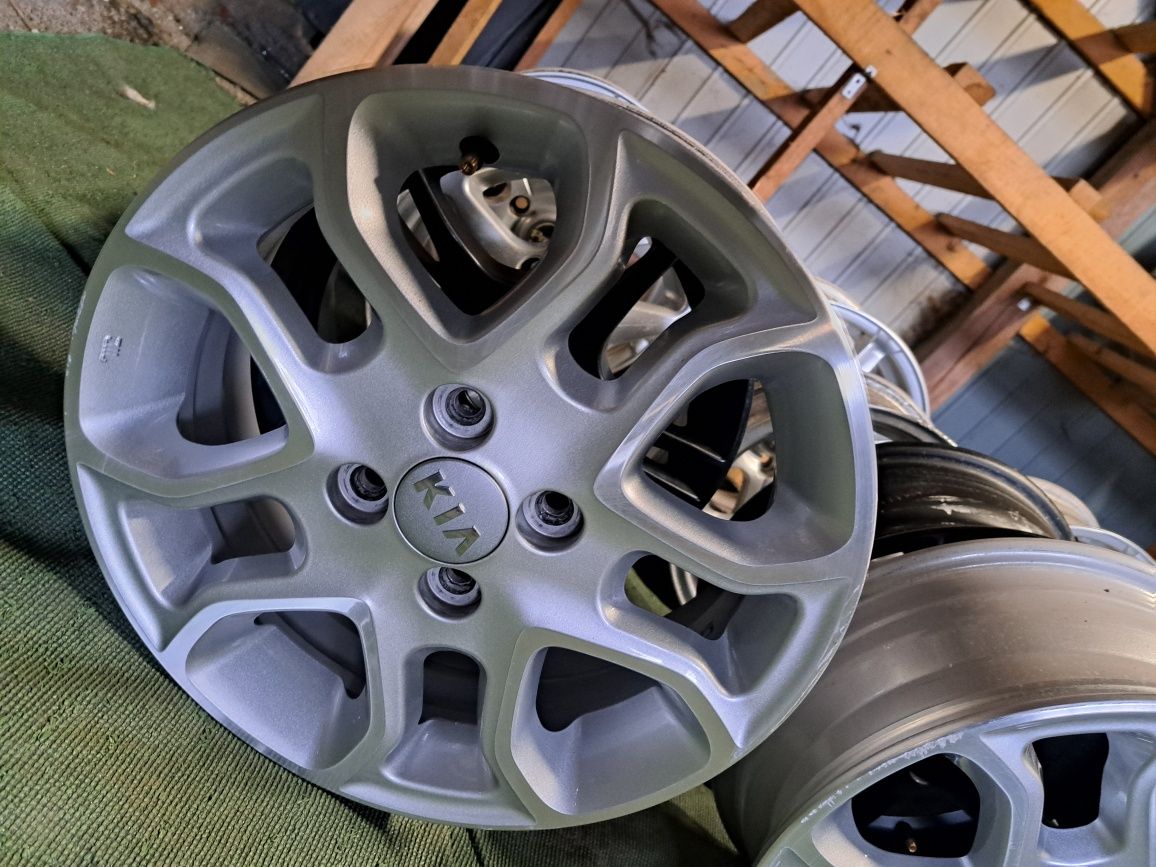 05 TSM alufelgi 4x100 5.5x15 et52 54.1 kia oryginalne srebrne polerowa