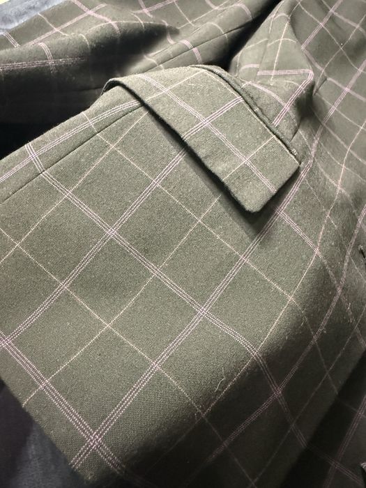 Піджак в полоску-клітинку