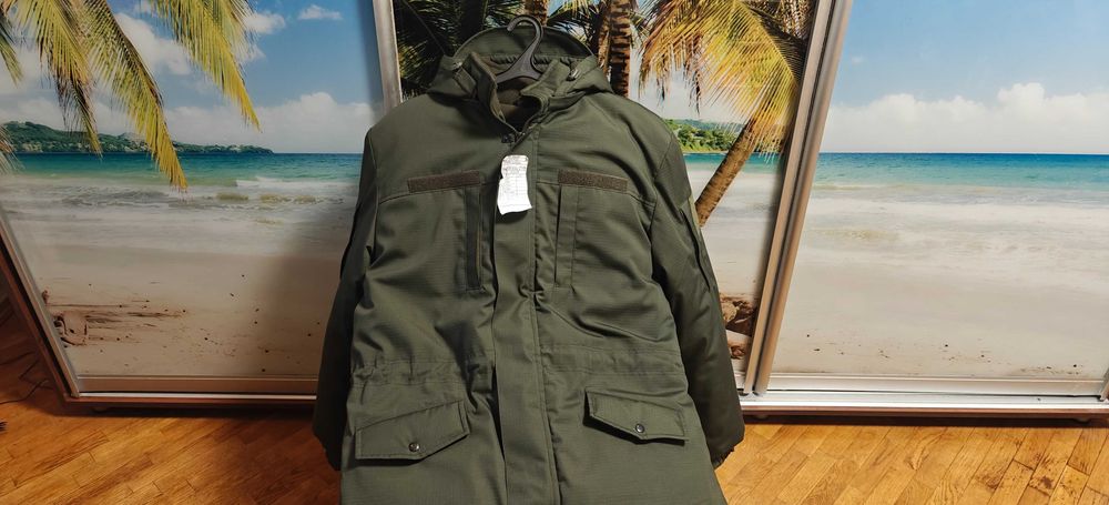 Куртка зимова чоловіча нова розмір 50 колір олива,підкладка фліс.