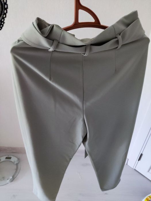 Брюки бірюзового кольору розмір 46 нові