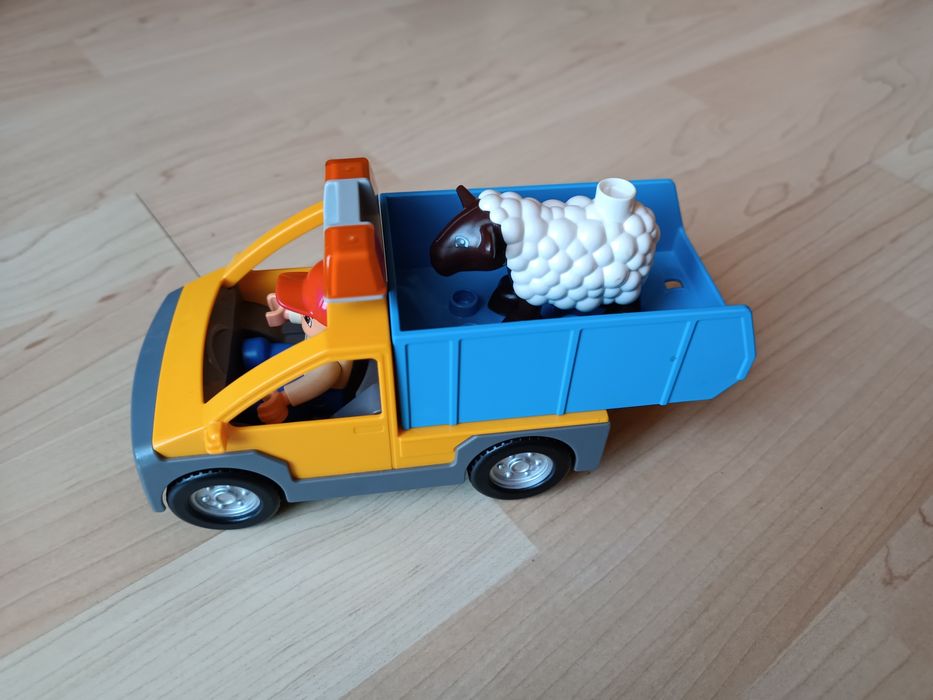 Klocki LEGO duplo zestaw auto przyczepa ludzik zwierzątko