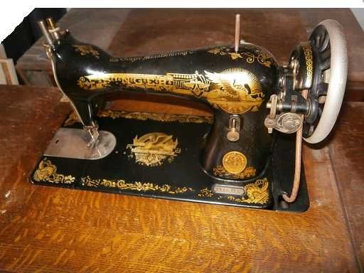 Máquina de Costura Singer antiga rebativel