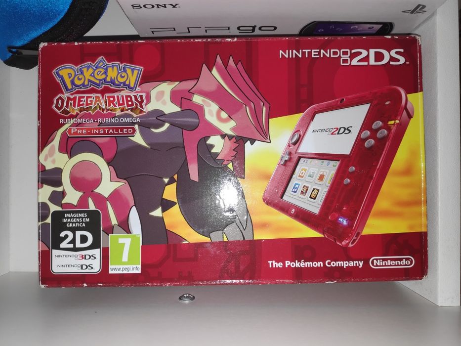 Nintendo 2DS vermelho na caixa