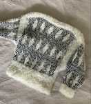 Miekki, wtochaty sweter