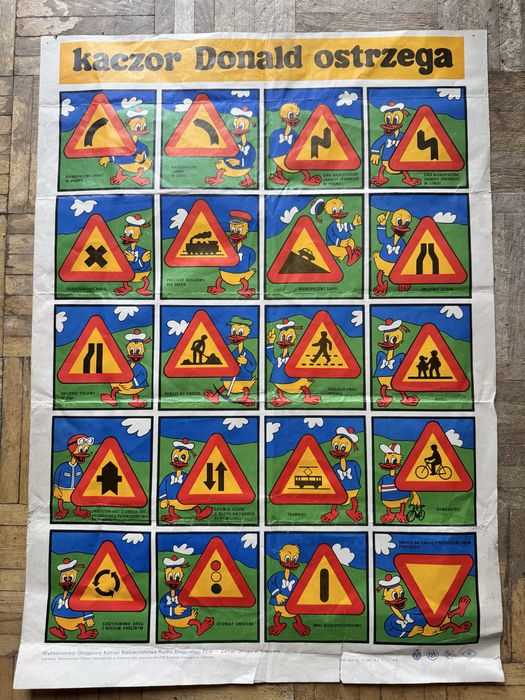 Plakat plansza kaczor donald ostrzega PZM ruch drogowy z tyłu DIPLOM