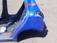 SUZUKI SWIFT MK6 III BŁOTNIK TYŁ LEWY  ZCG