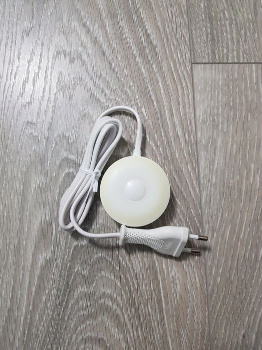 Зарядний пристрій для індуктивної електричной зубної щітки