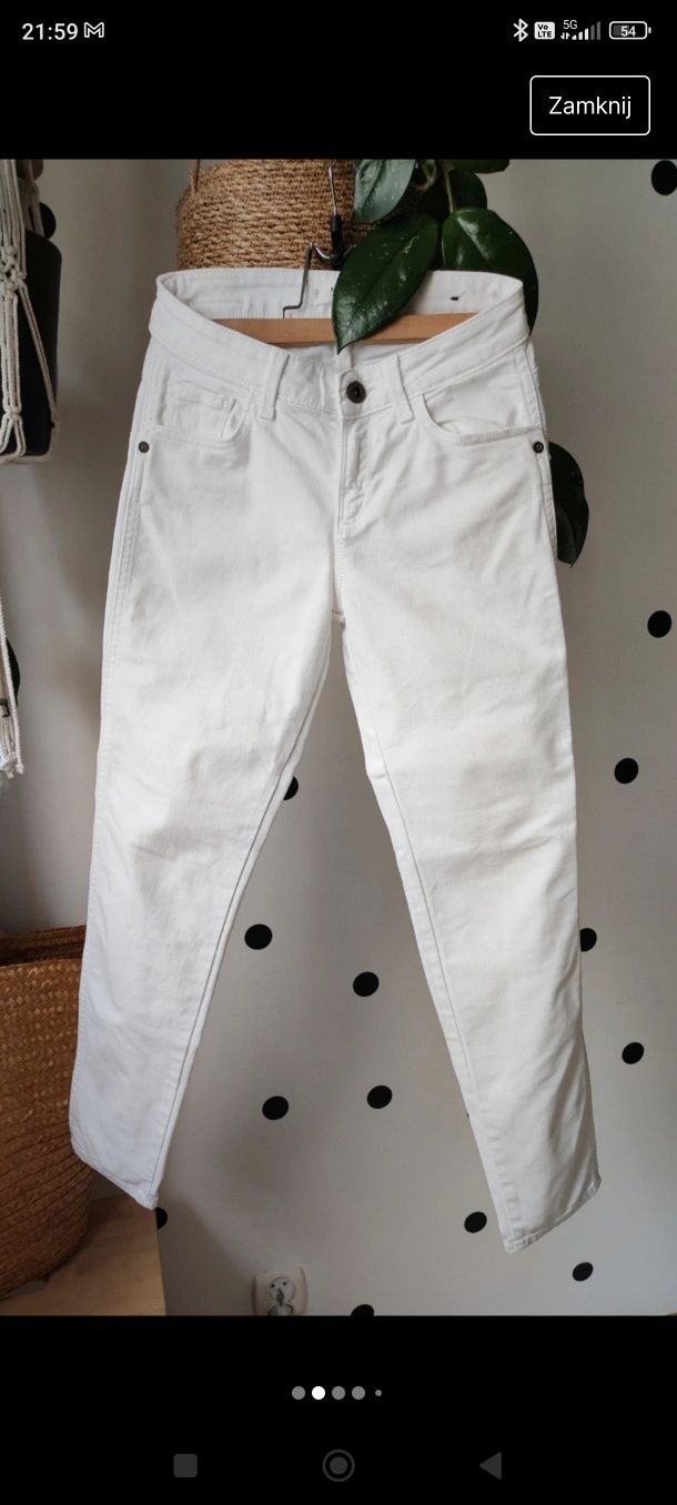 Białe spodnie jeansowe rurki skinny wysoki stan