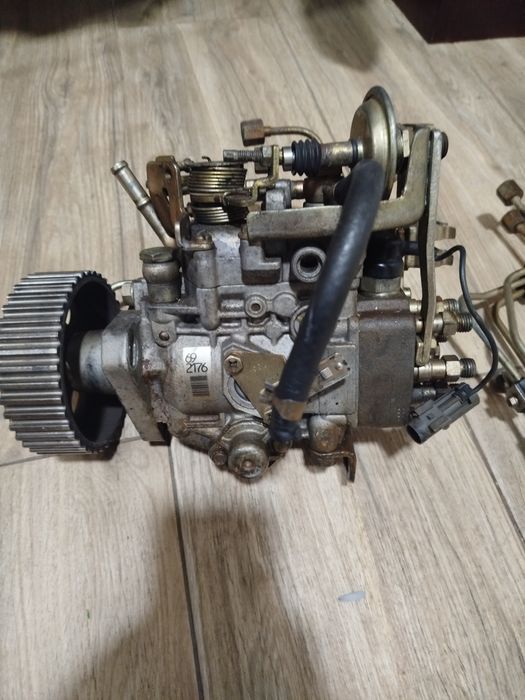 Bomba injetora de Nissan e motor de arranque