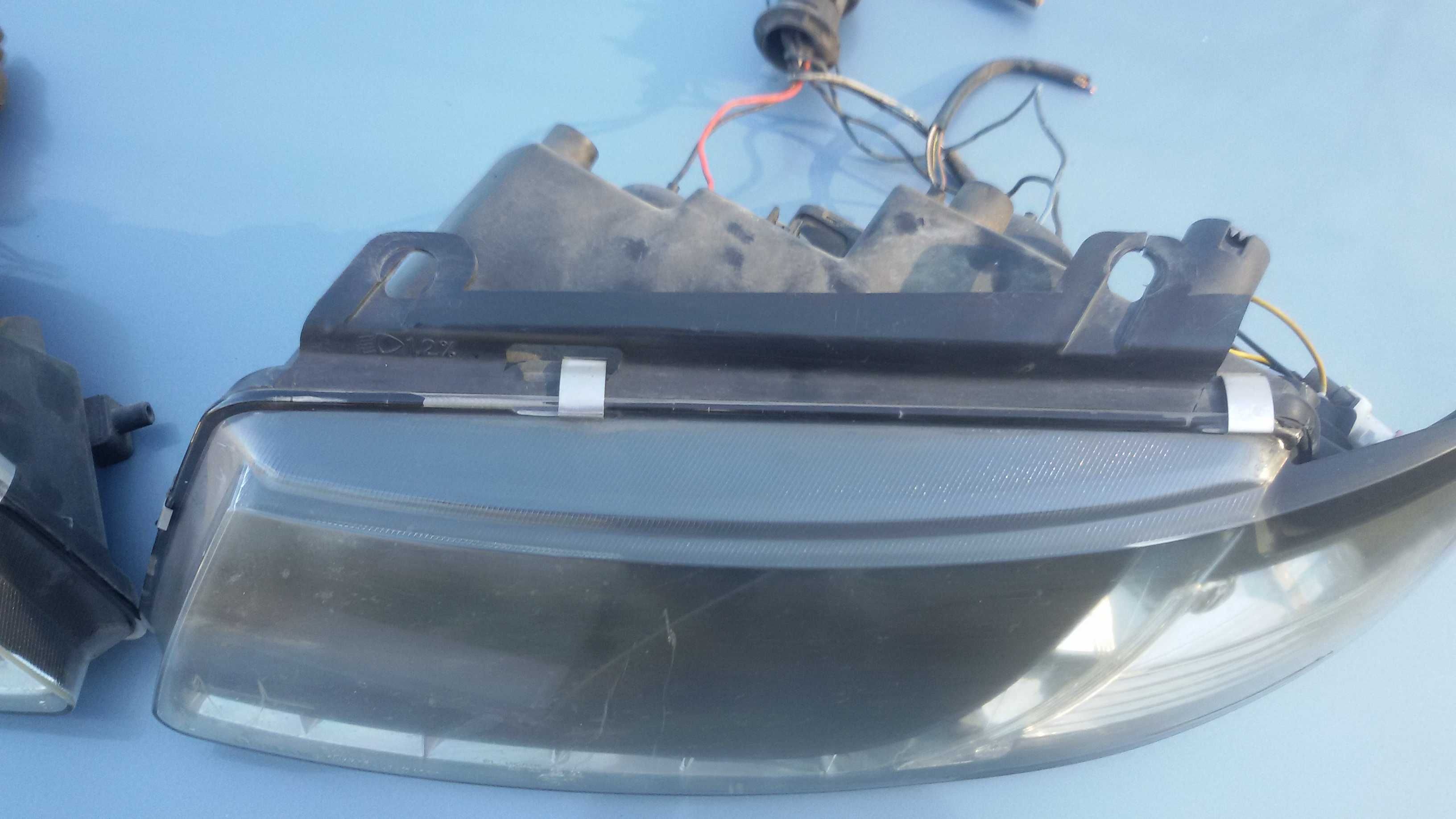 Lampy przednie czarne Vw Passat B5 SOCZEWKA