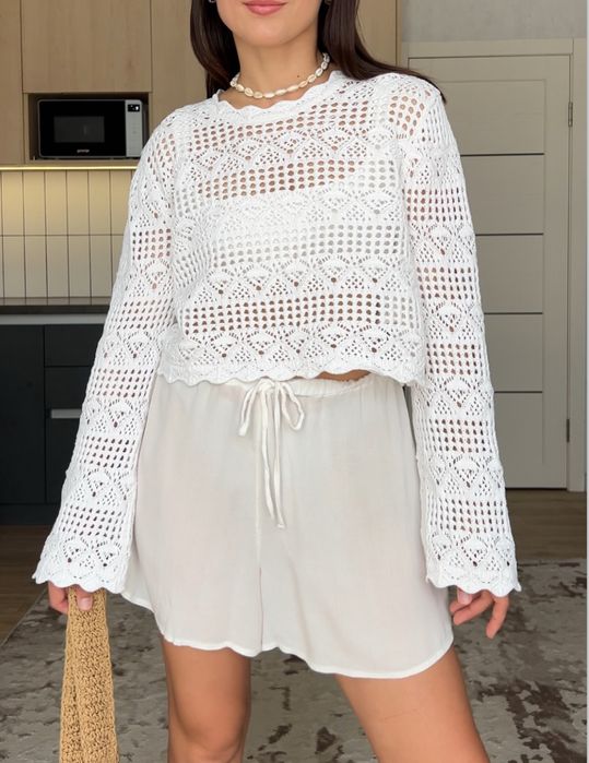 Біла кофта вʼязана