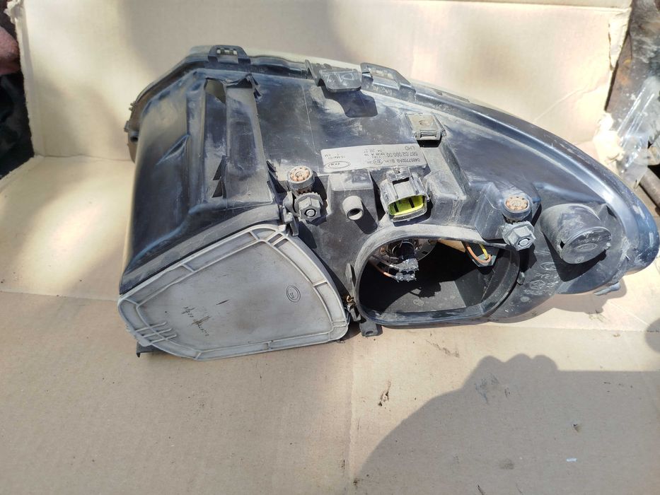 Фари передні Додж Dodge Caravan 4 Chrysler Voyager 4 (2001-2007)