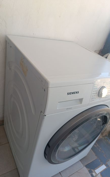 Máquina de lavar e secar