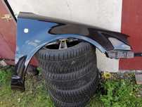 Błotnik prawy 9910 czarny Skoda Superb 1
