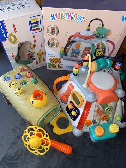 "Розвиваючі іграшки: Мультибокс та гра 'Нагодуй пташку'