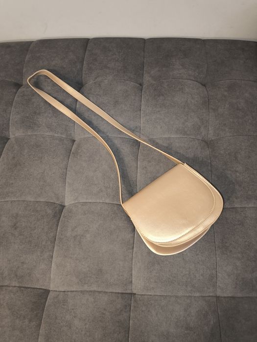 Złota torebka damska