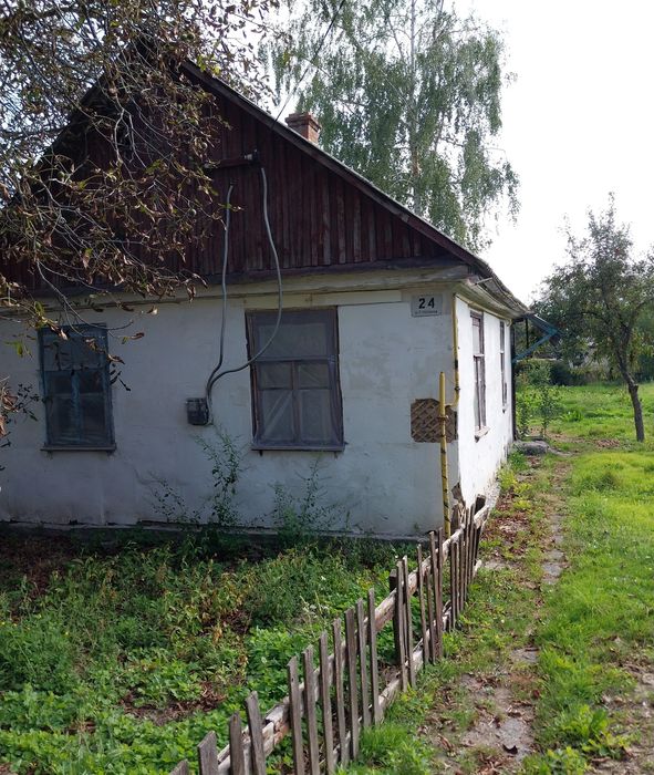 Будинок- земельна ділянка