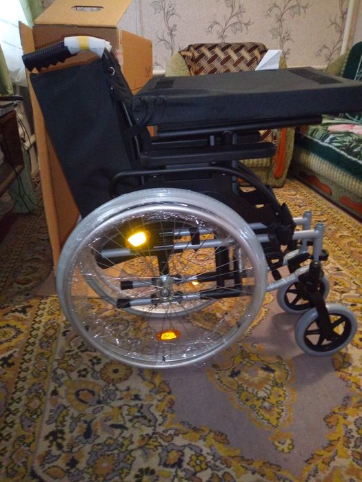 Инвалидная коляска
